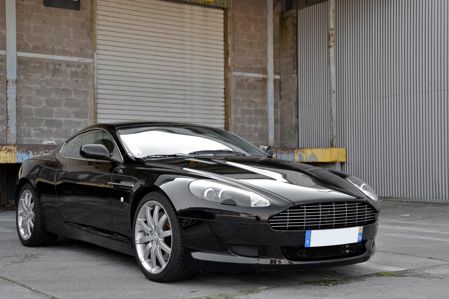 https://totalrenting.es/wp-content/uploads/2022/10/aston-martin-db9-coupe-2005-6-0-i-v12-48v-456-cv-coupe.png