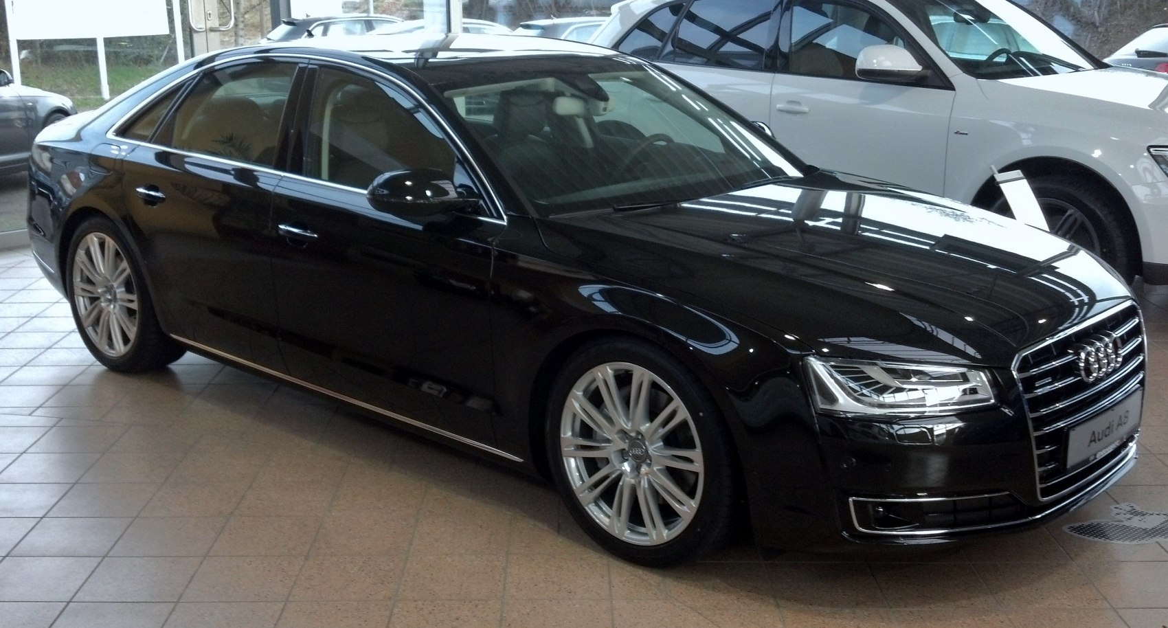 https://totalrenting.es/wp-content/uploads/2022/10/audi-a8-d4-4h-facelift-2013-2014-3-0-tdi-v6-clean-diesel-258-cv-quattro-tiptronic-berlina.png