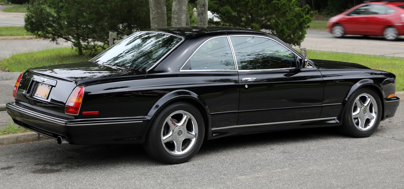 https://totalrenting.es/wp-content/uploads/2022/10/bentley-continental-t-1996-6-8-i-v8-426-cv-coupe-1.png