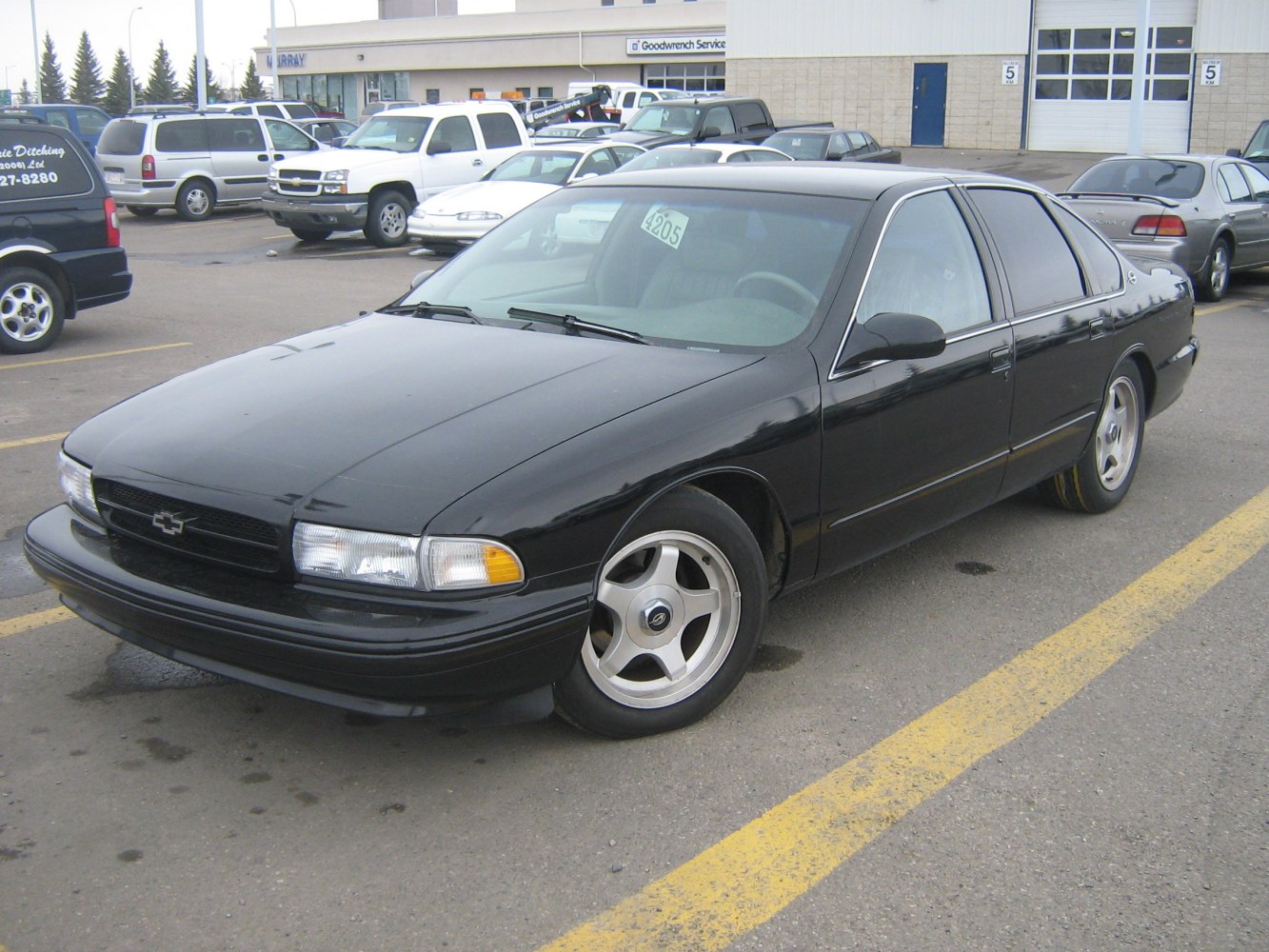 https://totalrenting.es/wp-content/uploads/2022/10/chevrolet-impala-vii-1994-5-7i-264-cv-berlina-2.png