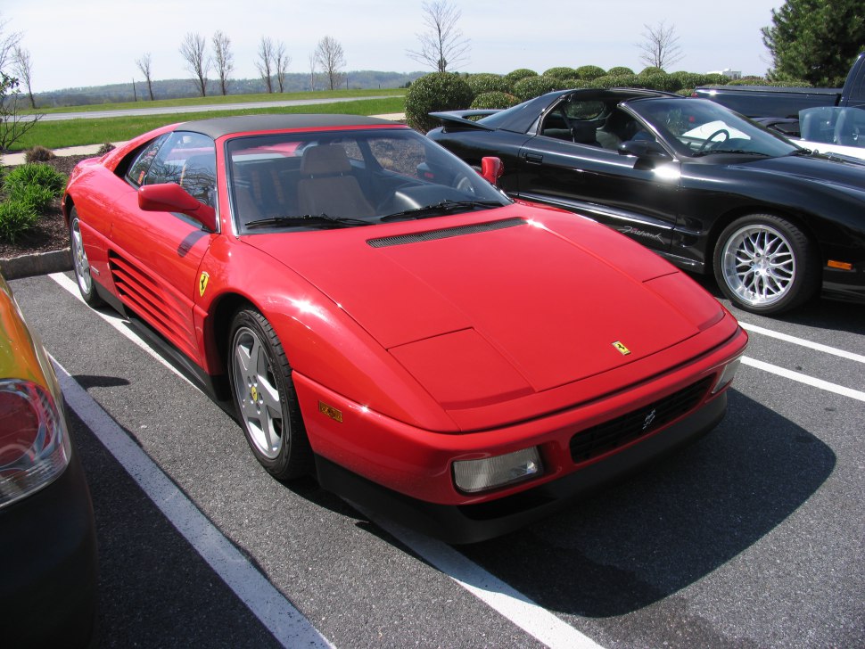 https://totalrenting.es/wp-content/uploads/2022/10/ferrari-348-ts-1990-3-4-v8-300-cv-targa.png