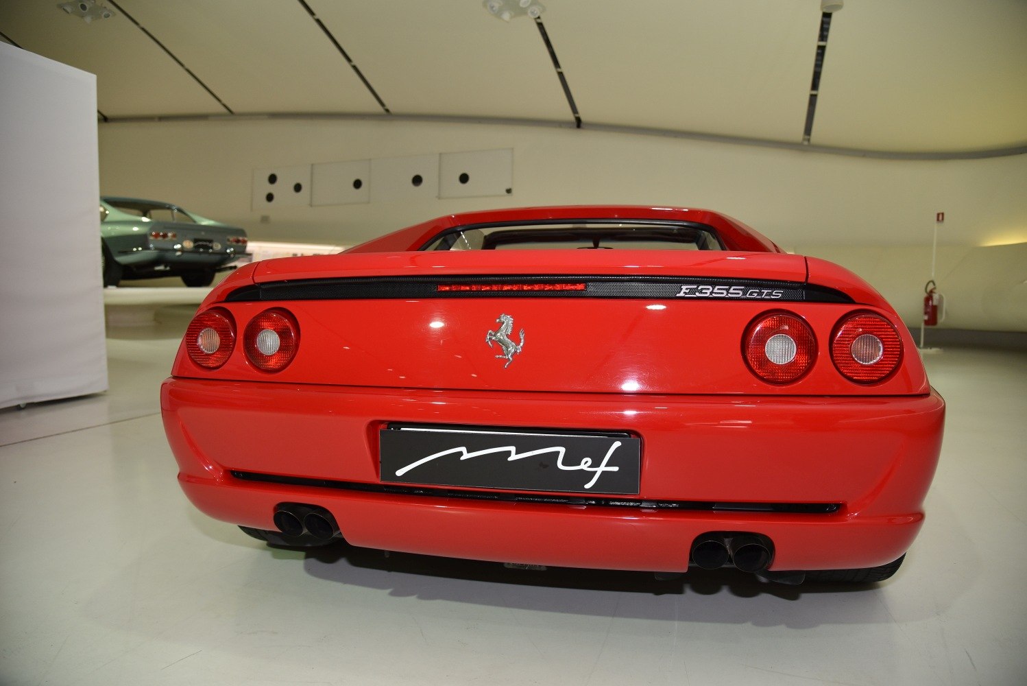 https://totalrenting.es/wp-content/uploads/2022/10/ferrari-f355-gts-1996-355-gts-381-cv-coupe-4.png