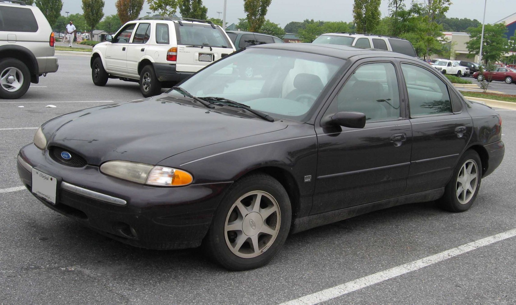 https://totalrenting.es/wp-content/uploads/2022/10/ford-contour-1995-2-0i-16v-132-cv-berlina.png