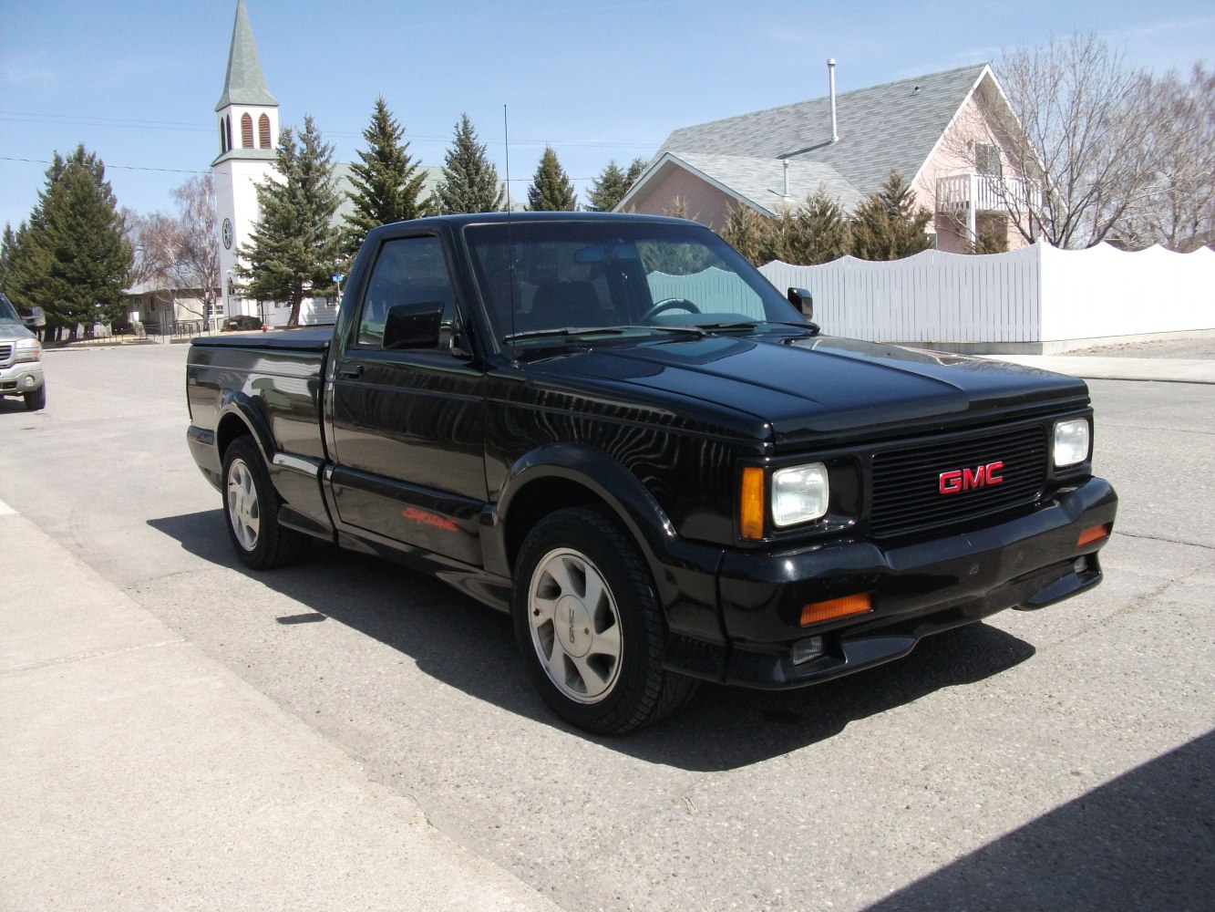 https://totalrenting.es/wp-content/uploads/2022/10/gmc-syclone-1991-4-3-i-v6-4wd-280-cv-pick-up-1.png