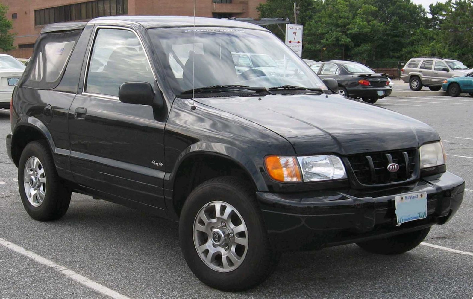 https://totalrenting.es/wp-content/uploads/2022/10/kia-sportage-soft-top-i-1997-2-0-i-95-cv-suv.png