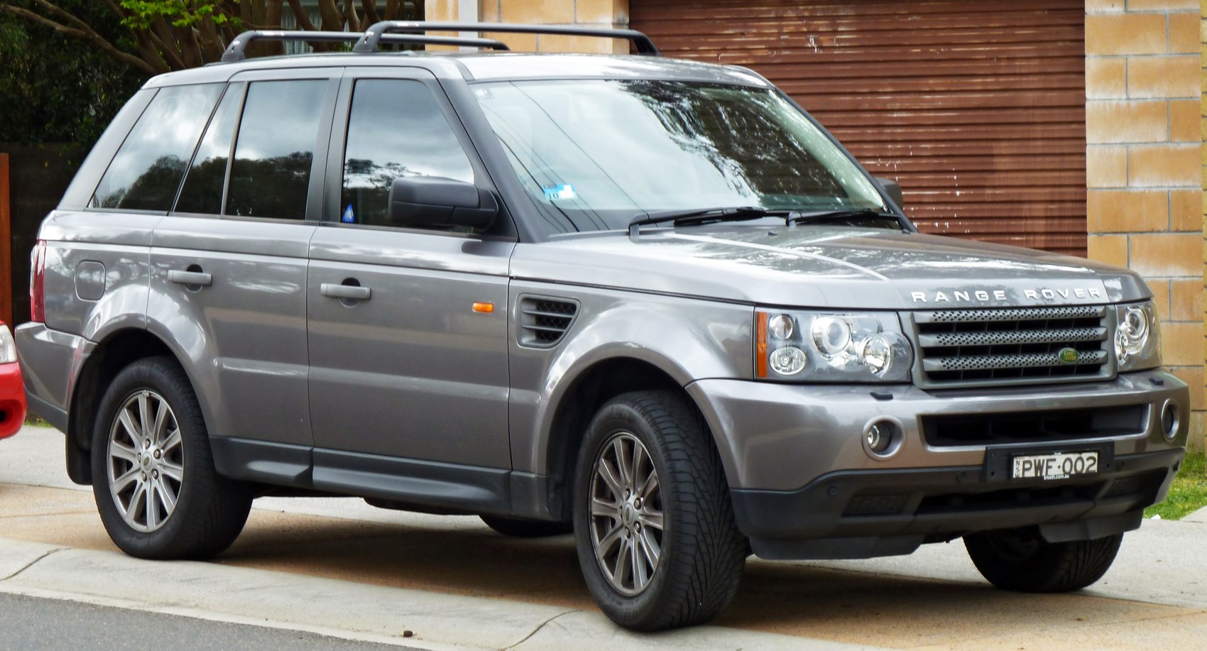 https://totalrenting.es/wp-content/uploads/2022/10/land-rover-range-rover-sport-i-2005-2-7-tdv6-190-cv-awd-automatic-suv.png