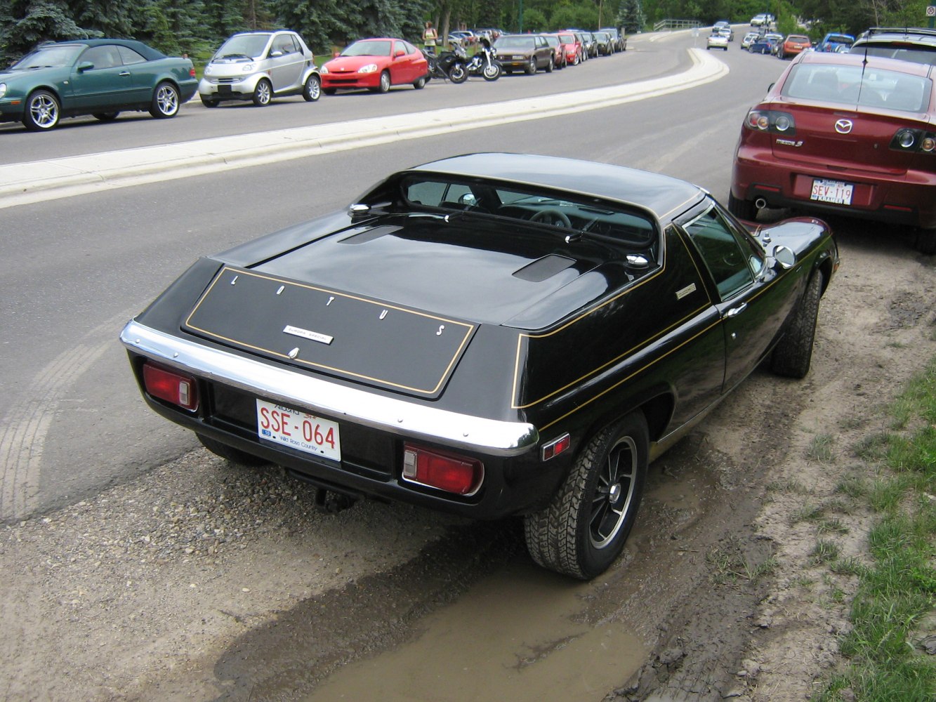 https://totalrenting.es/wp-content/uploads/2022/10/lotus-europa-1971-1-6-106-cv-coupe-4.png