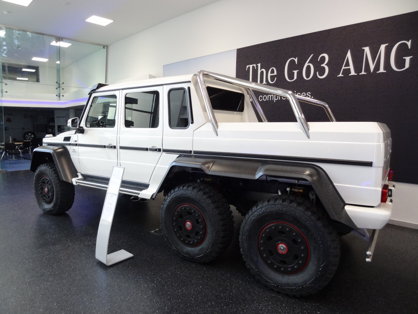 https://totalrenting.es/wp-content/uploads/2022/10/mercedes-benz-g-class-6x6-w463-2013-amg-g-63-v8-544-cv-6x6-7g-tronic-speedshift-plus-pick-up-3.png