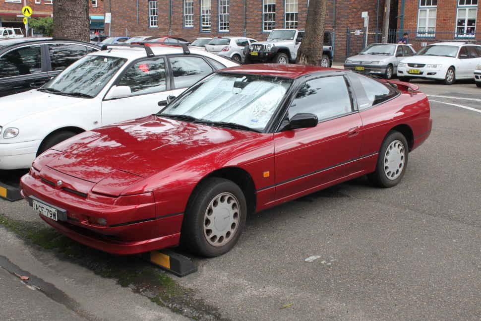 https://totalrenting.es/wp-content/uploads/2022/10/nissan-200-sx-s13-1989-1-8-turbo-169-cv-coupe.png