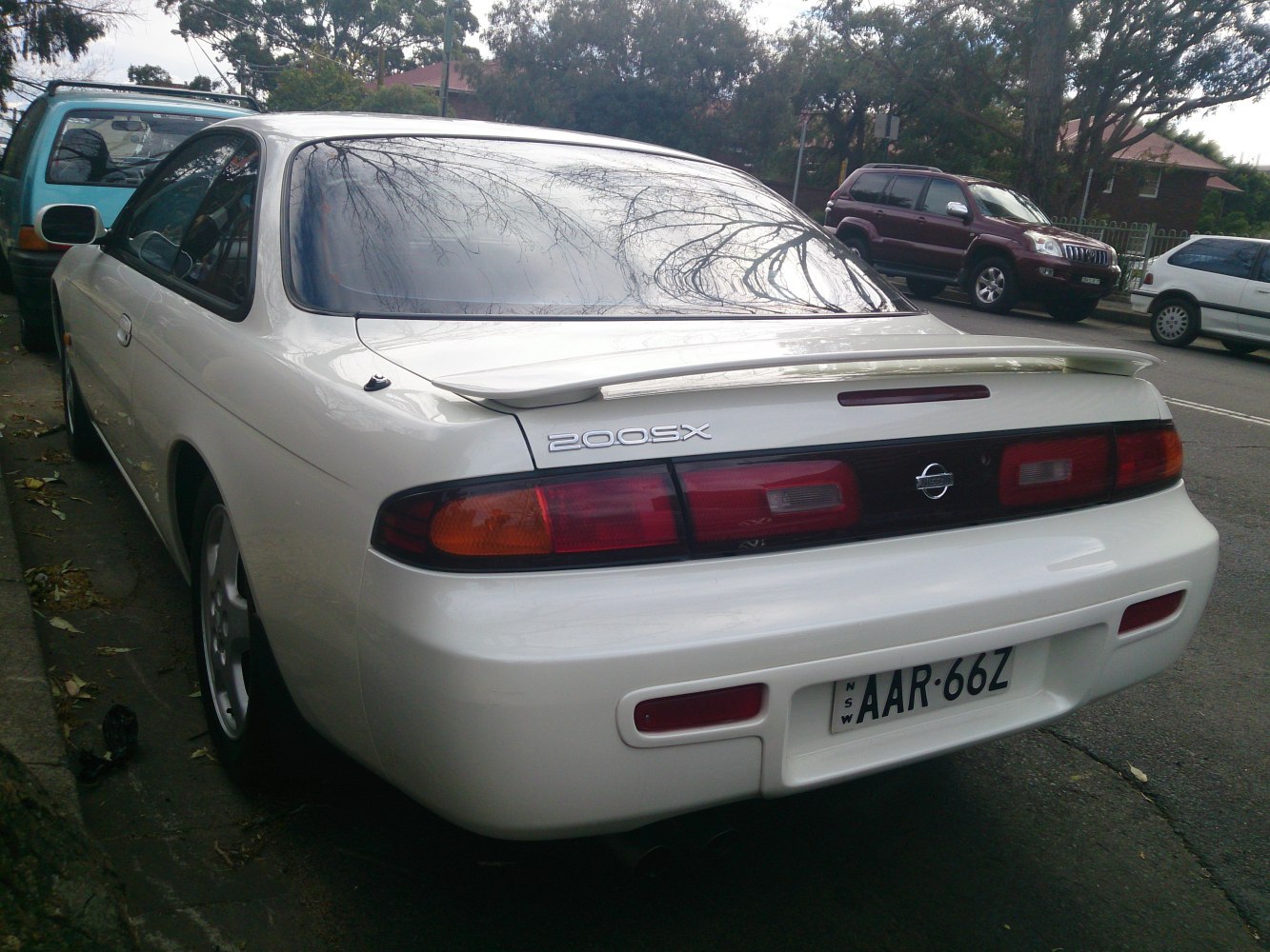 https://totalrenting.es/wp-content/uploads/2022/10/nissan-200-sx-s14-1993-2-0-i-16v-turbo-200-cv-coupe-3.png