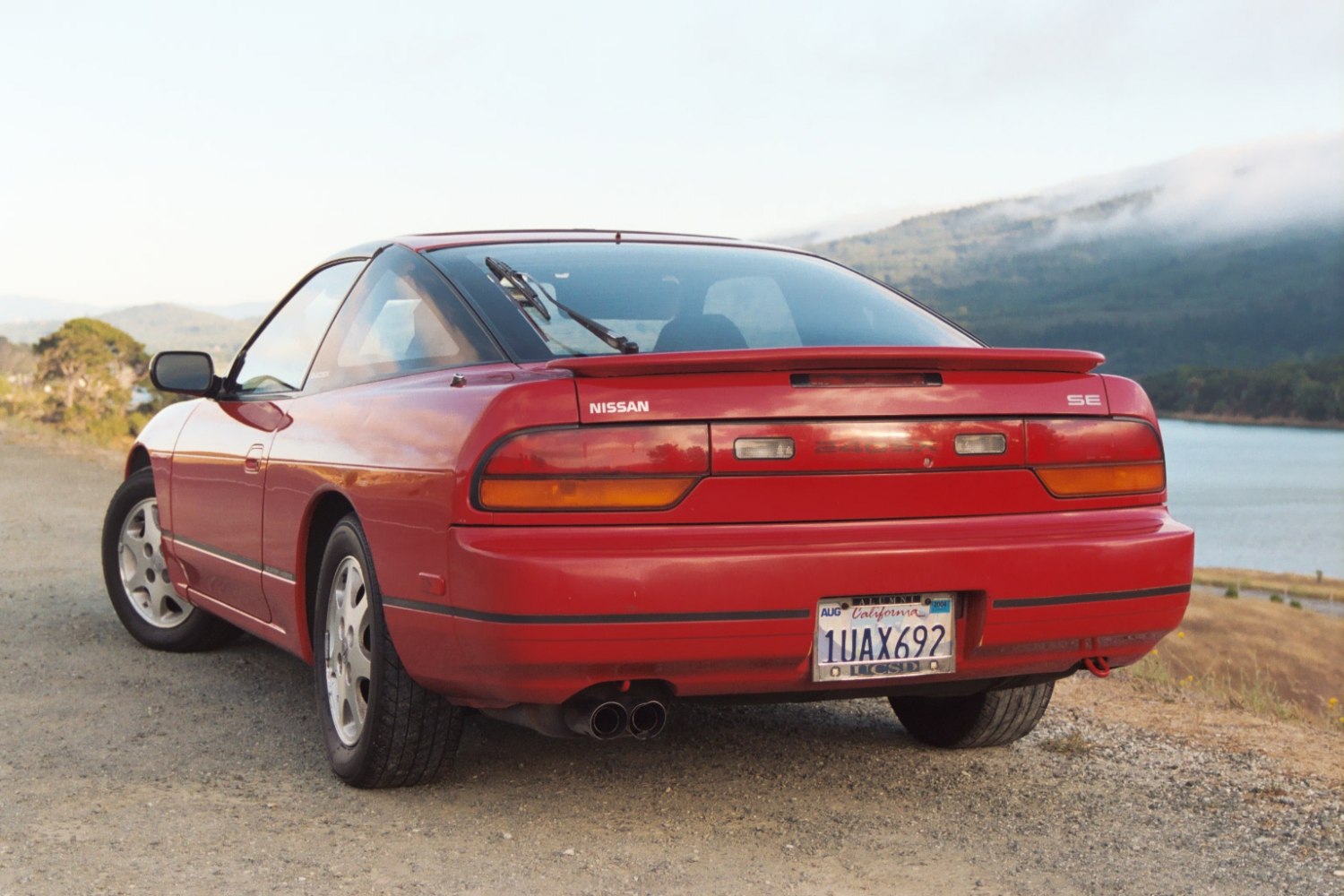 https://totalrenting.es/wp-content/uploads/2022/10/nissan-240sx-fastback-s13-facelift-1991-1991-2-4-155-cv-hatchback-fastback-3.png