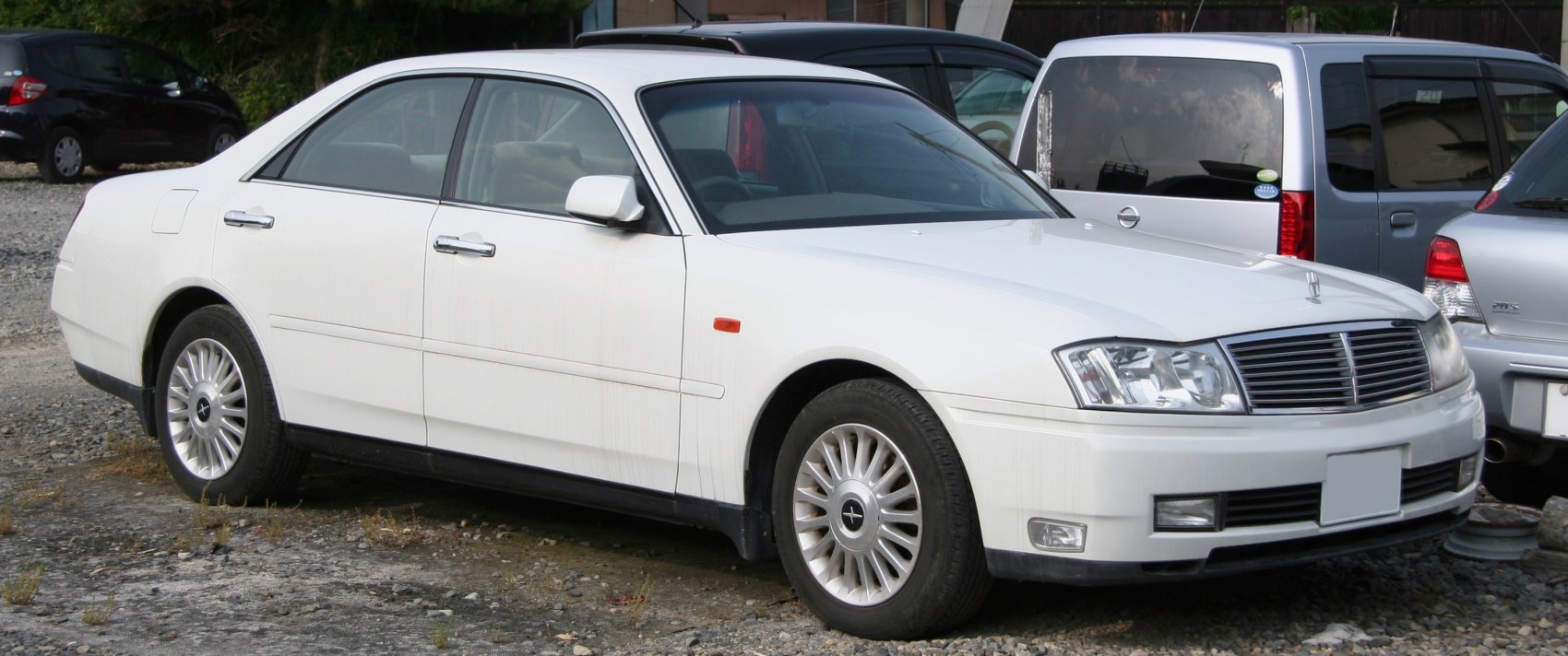 https://totalrenting.es/wp-content/uploads/2022/10/nissan-cedric-y34-1999-2-5-i-v6-24v-210-cv-berlina.png