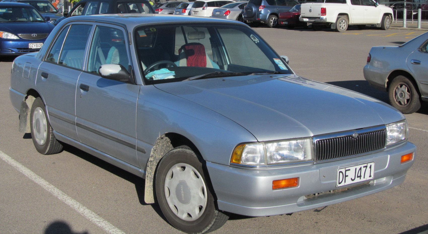 https://totalrenting.es/wp-content/uploads/2022/10/nissan-crew-k30-1994-2-0-i-12v-130-cv-berlina-1.png