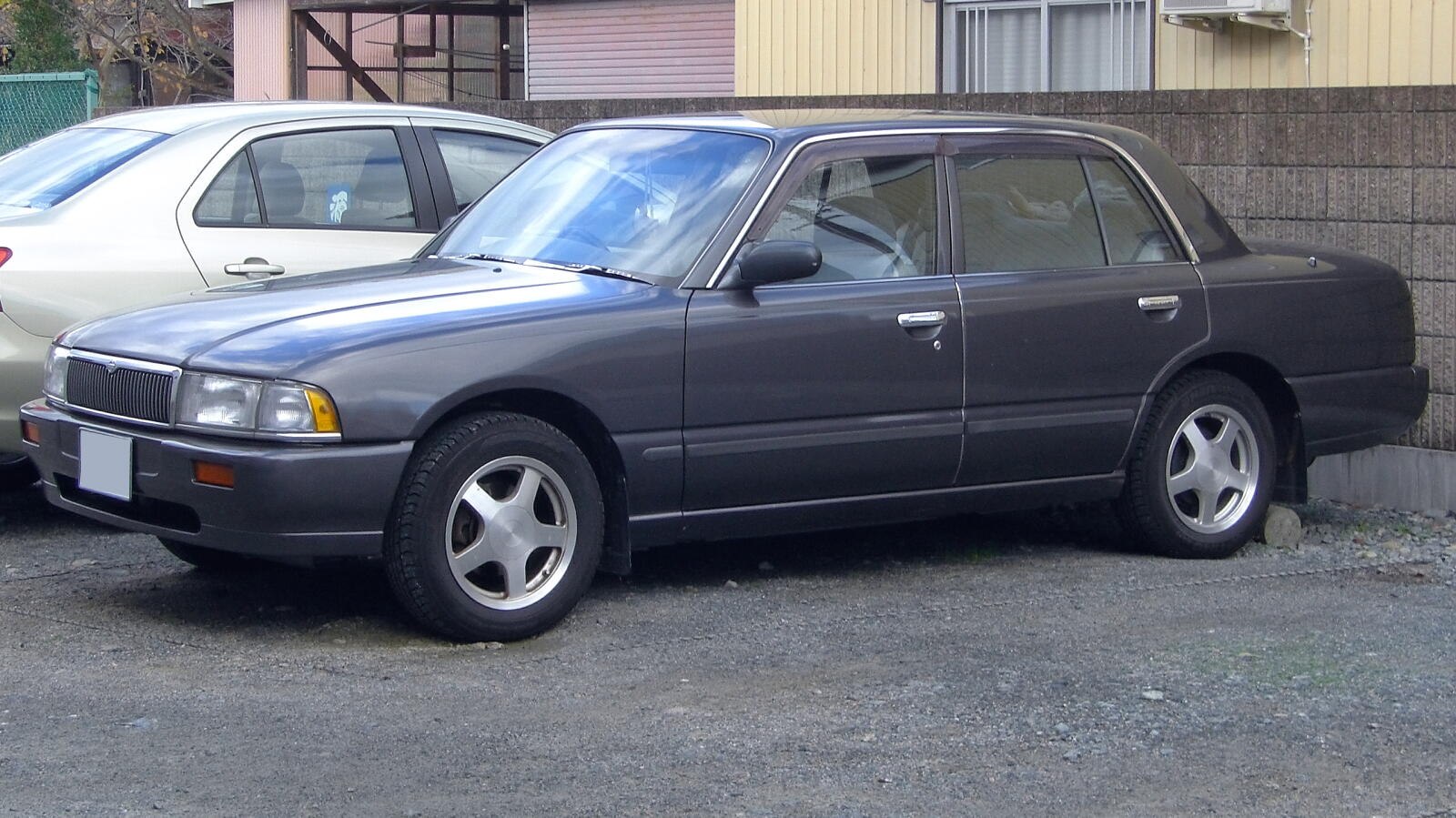 https://totalrenting.es/wp-content/uploads/2022/10/nissan-crew-k30-1994-2-0-i-12v-130-cv-berlina.png