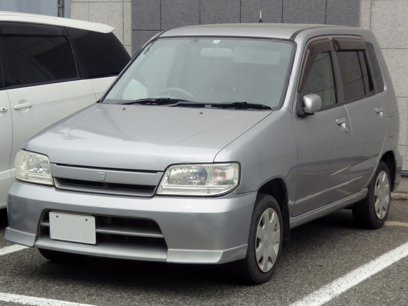 https://totalrenting.es/wp-content/uploads/2022/10/nissan-cube-z10-1998-1-3-i-16v-101-cv-minivan.png