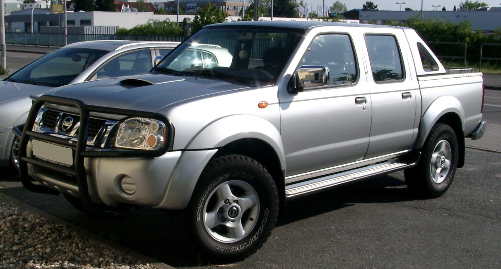 https://totalrenting.es/wp-content/uploads/2022/10/nissan-navara-ii-d22-1998-2-4-double-cab-4wd-148-cv-pick-up-2.png