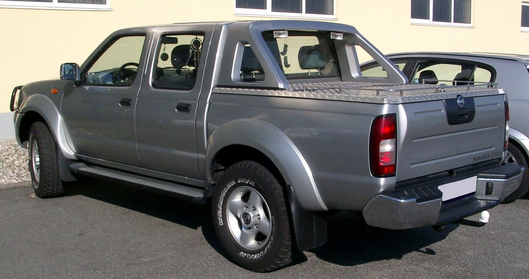 https://totalrenting.es/wp-content/uploads/2022/10/nissan-navara-ii-d22-1998-2-4-double-cab-4wd-148-cv-pick-up-3.png