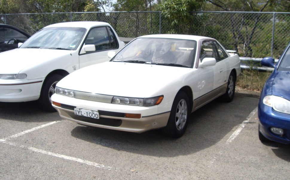 https://totalrenting.es/wp-content/uploads/2022/10/nissan-silvia-s13-1990-1-8i-135-cv-coupe.png