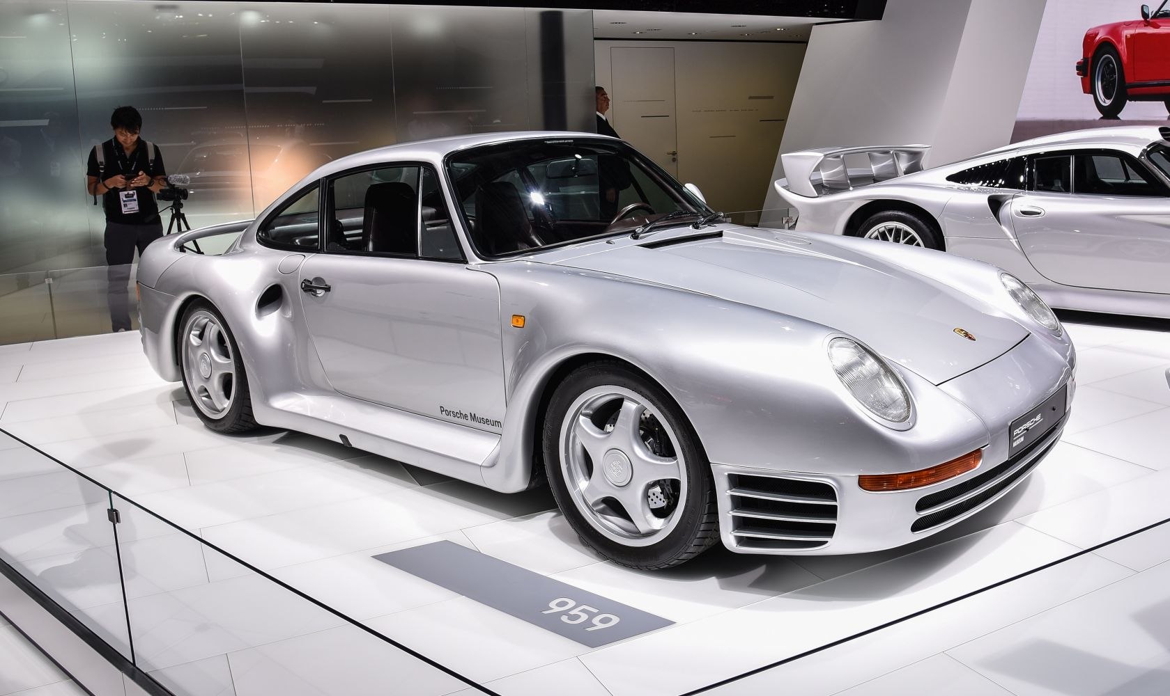 https://totalrenting.es/wp-content/uploads/2022/10/porsche-959-1987-2-8-450-cv-awd-coupe.png