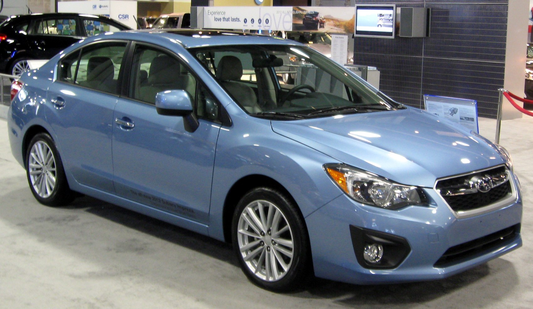 https://totalrenting.es/wp-content/uploads/2022/10/subaru-impreza-iv-sedan-2012-1-6i-114-cv-awd-mt-berlina.png