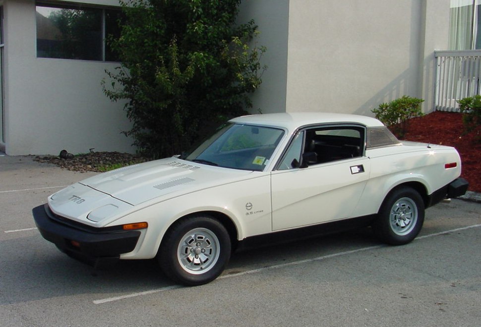 https://totalrenting.es/wp-content/uploads/2022/10/triumph-tr-8-1978-3-5-133-cv-coupe.png