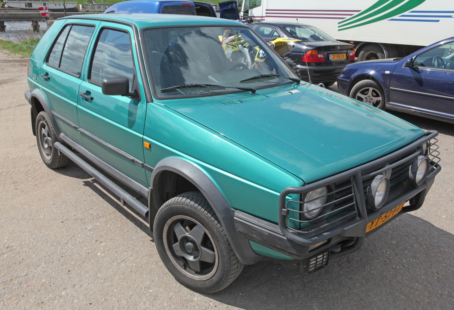 https://totalrenting.es/wp-content/uploads/2022/10/volkswagen-golf-ii-country-1990-1-8-98-cv-syncro-hatchback-crossover-1.png