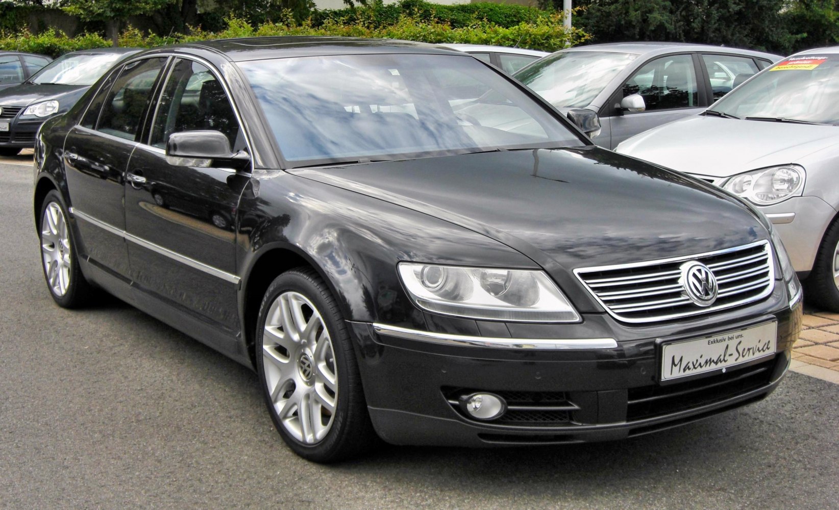 https://totalrenting.es/wp-content/uploads/2022/10/volkswagen-phaeton-2003-3-2-v6-241-cv-berlina.png