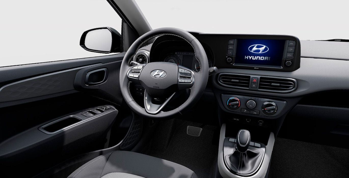Hyundai i10 Klass Auto interior delantera 2 | Total Renting