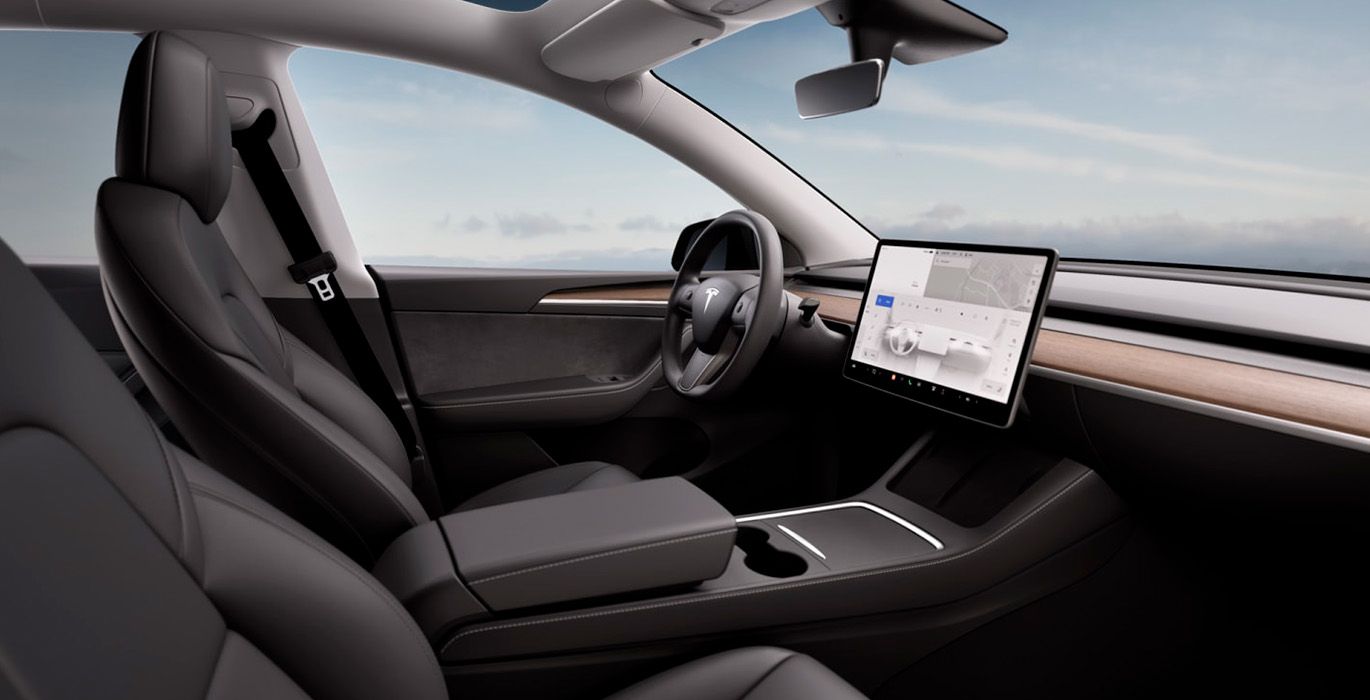Tesla Model Y interior perfil | Total Renting